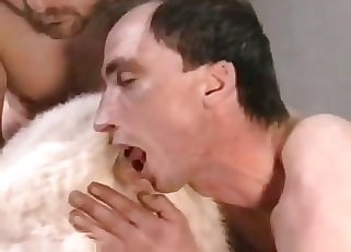 Mature blonde in a zoophile orgy